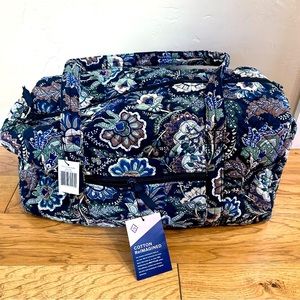 Vera Bradley quilted weekender travel bag with matching purse.